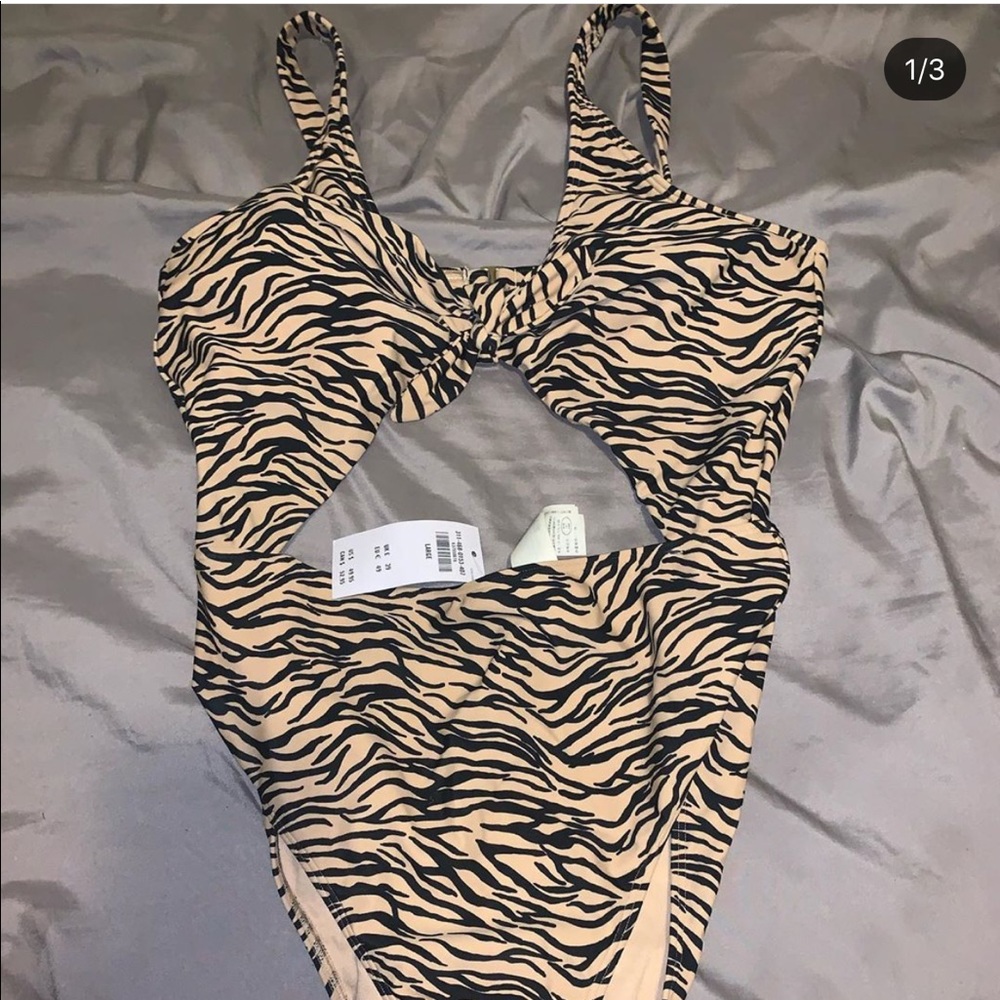 NWT cut out One piece